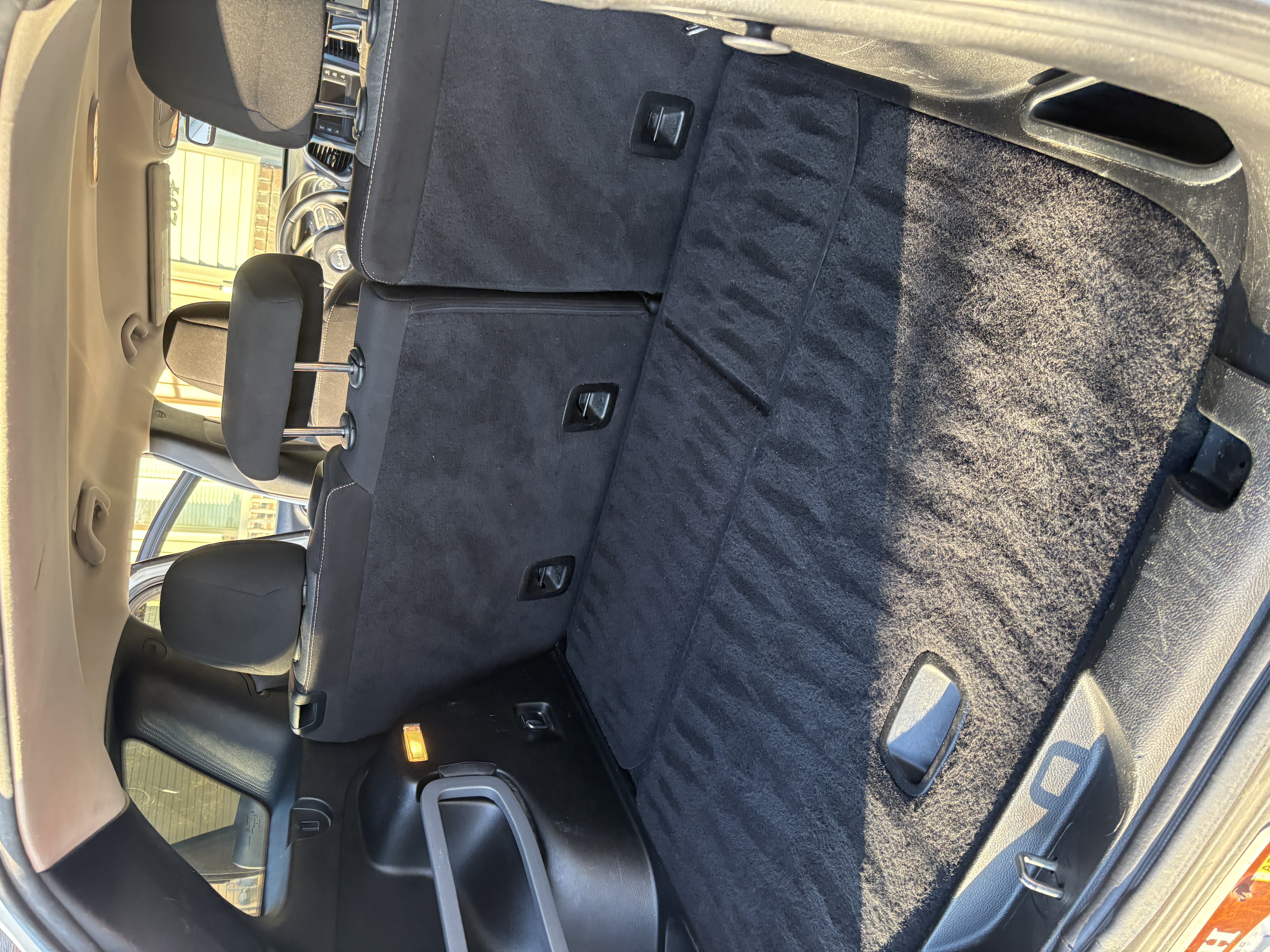 Car carpet shampooing for dog hair and milk spills in Jeep Grand Cherokee trunk in Layton Utah