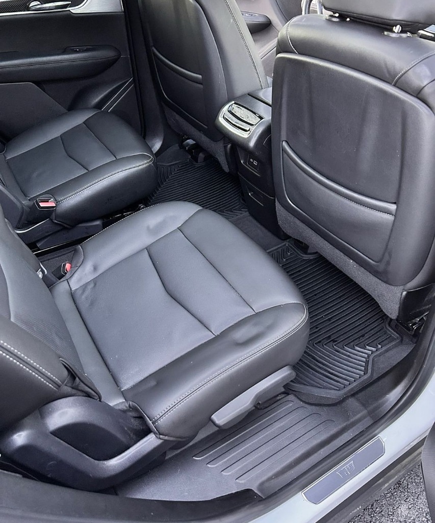 Immaculate conditioned leather backseat after deep cleaning and mobile detailing in South Ogden Utah