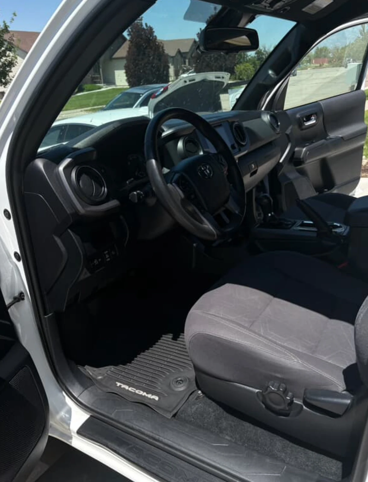 Immaculate sanitized car interior after steam clean and car carpet shampooing mobile detailing service