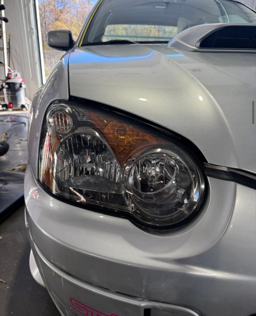Crystal clear restored car headlight looking brand new for safety in Northern Utah